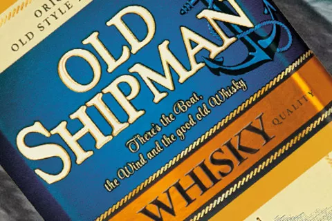 Old Shipman Whisky – wyjątkowe wyróżnienie w świecie alkoholi Zdjęcie butelki Old Shipman Whisky z wyjątkowym wyróżnieniem
